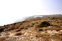 A distant view of one of the protective 'tents' at Mnajdra.