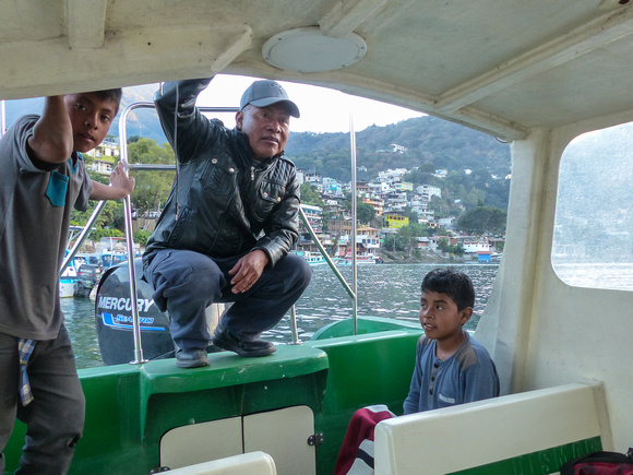 ...where  our  boatman waits to take us back across Lake Atitlan.