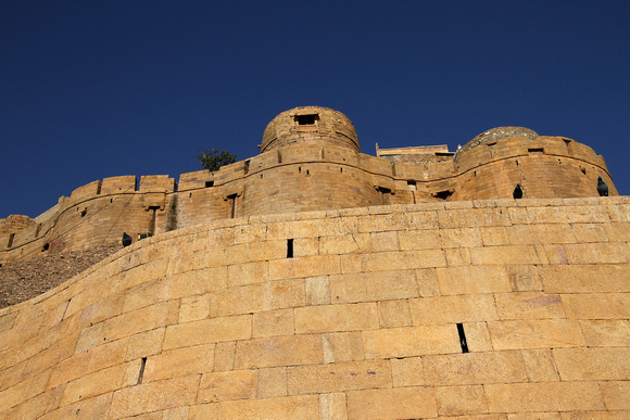 The massive  walls  of Jaisalmer  Fort, also known as the Golden Fort.