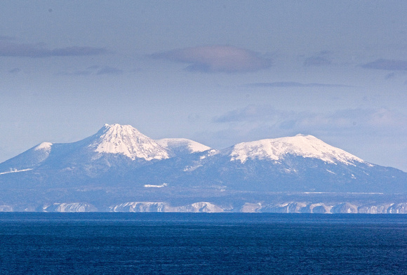 The Kuril Islands, with snow-capped volcano