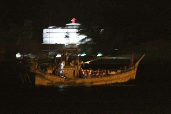 This was a  boat-load of Burmese refugees...but probably  being paraded  by the authorities  before being  repatriated.