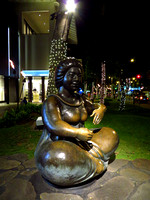 ..with a  Polynesian-style bronze statue..