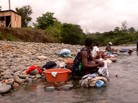 Washing clothes in the river