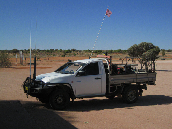 A typical Outback 'ute'...with flag  so they can see each other  coming  behind the  dune ridges...guess there  have been a  fair  few  head-ons !!